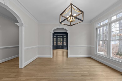 LAKE VIEWS AND A PREMIER GREAT WATERS LOCATION PRESENT AN on Great Waters Course At Reynolds Plantation in Georgia - for sale on GolfHomes.com, golf home, golf lot