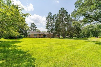 Enjoy the expansive back yard from your patio. Situated next to on Breezy Point Golf Course Resort in Minnesota - for sale on GolfHomes.com, golf home, golf lot