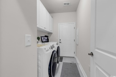 This is a must see Serenity villa located in the Del Webb 55+ on Myrtlewood Golf Course and Club  in South Carolina - for sale on GolfHomes.com, golf home, golf lot