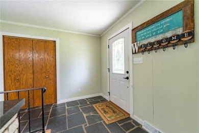 Enjoy the expansive back yard from your patio. Situated next to on Breezy Point Golf Course Resort in Minnesota - for sale on GolfHomes.com, golf home, golf lot