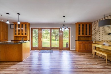 Enjoy the expansive back yard from your patio. Situated next to on Breezy Point Golf Course Resort in Minnesota - for sale on GolfHomes.com, golf home, golf lot