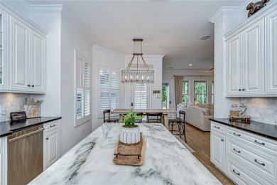 Under contract-accepting backup offers. Absolutely STUNNING pool on Westchase Golf Club in Florida - for sale on GolfHomes.com, golf home, golf lot