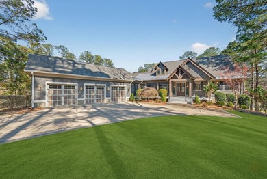 Impeccably maintained, this stunning home offers sweeping views on Reynolds Lake Oconee - The Oconee in Georgia - for sale on GolfHomes.com, golf home, golf lot