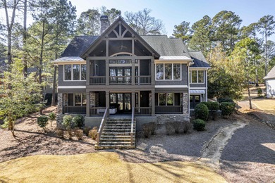 Impeccably maintained, this stunning home offers sweeping views on Reynolds Lake Oconee - The Oconee in Georgia - for sale on GolfHomes.com, golf home, golf lot