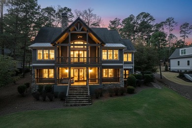 Impeccably maintained, this stunning home offers sweeping views on Reynolds Lake Oconee - The Oconee in Georgia - for sale on GolfHomes.com, golf home, golf lot