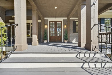 Impeccably maintained, this stunning home offers sweeping views on Reynolds Lake Oconee - The Oconee in Georgia - for sale on GolfHomes.com, golf home, golf lot