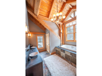 Enjoy perfect Vermont styling in this inspiring timber frame on Mount Snow Golf Club in Vermont - for sale on GolfHomes.com, golf home, golf lot