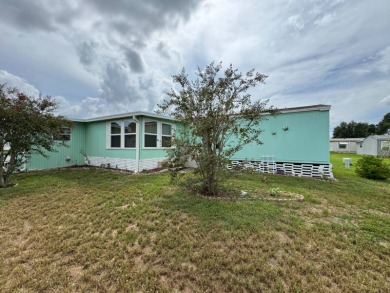 This immaculate, well-maintained 2 bedroom/2 bath manufactured on Lake Henry Golf Club in Florida - for sale on GolfHomes.com, golf home, golf lot
