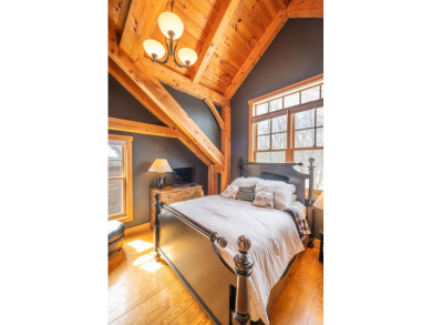 Enjoy perfect Vermont styling in this inspiring timber frame on Mount Snow Golf Club in Vermont - for sale on GolfHomes.com, golf home, golf lot