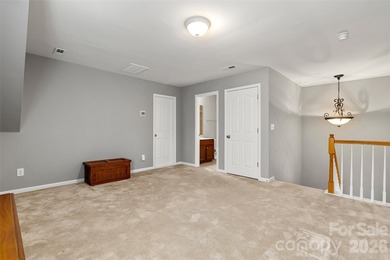 TEGA CAY LIVING AT ITS BEST! This beautiful 3 story townhome is on Tega Cay Golf Club in South Carolina - for sale on GolfHomes.com, golf home, golf lot