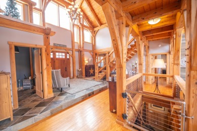 Enjoy perfect Vermont styling in this inspiring timber frame on Mount Snow Golf Club in Vermont - for sale on GolfHomes.com, golf home, golf lot