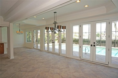 ABSOLUTELY STUNNING CUSTOM WATERFRONT HOME offers fabulous long on Saint Andrews South Golf Club in Florida - for sale on GolfHomes.com, golf home, golf lot