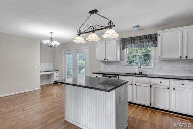 Welcome to 44 Normandy Drive -- a rare opportunity to own a on Lake Saint Louis Par 3 in Missouri - for sale on GolfHomes.com, golf home, golf lot