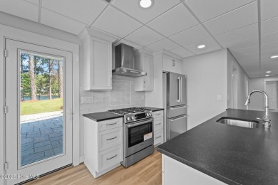 Finally, A Lake Auman beauty recreated !  Totally remodeled. 9 on Beacon Ridge Golf and Country Club in North Carolina - for sale on GolfHomes.com, golf home, golf lot