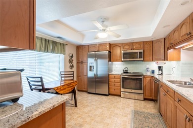 Located in the desirable East Lake area, this updated 2-bedroom on Tarpon Woods Golf Club in Florida - for sale on GolfHomes.com, golf home, golf lot