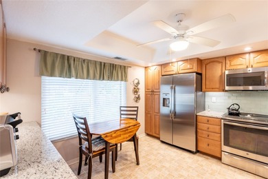 Located in the desirable East Lake area, this updated 2-bedroom on Tarpon Woods Golf Club in Florida - for sale on GolfHomes.com, golf home, golf lot