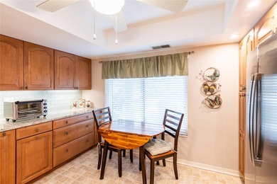 Located in the desirable East Lake area, this updated 2-bedroom on Tarpon Woods Golf Club in Florida - for sale on GolfHomes.com, golf home, golf lot