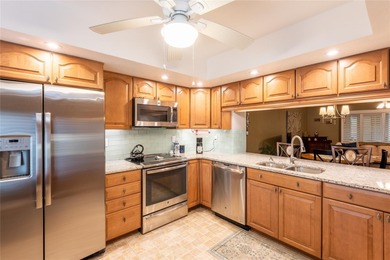 Located in the desirable East Lake area, this updated 2-bedroom on Tarpon Woods Golf Club in Florida - for sale on GolfHomes.com, golf home, golf lot