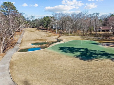 Perfectly positioned along the 5th hole of the Jack on Great Waters Course At Reynolds Plantation in Georgia - for sale on GolfHomes.com, golf home, golf lot