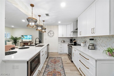 This fully updated pool home offers the space, flexibility, and on Raptor Bay Golf Club in Florida - for sale on GolfHomes.com, golf home, golf lot