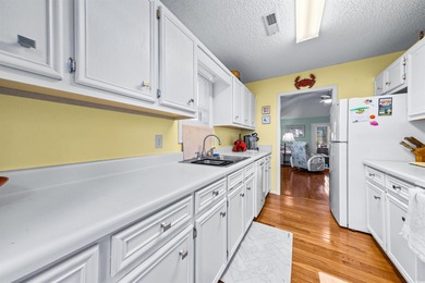 Located just a short golf cart ride from the beach, this on Possum Trot Golf Course in South Carolina - for sale on GolfHomes.com, golf home, golf lot