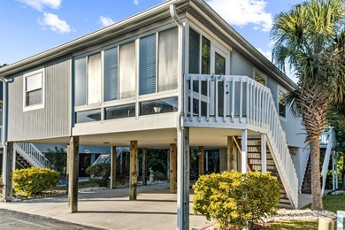 Located just a short golf cart ride from the beach, this on Possum Trot Golf Course in South Carolina - for sale on GolfHomes.com, golf home, golf lot