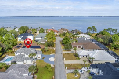 PRIVATE OASIS retreat with massive Heated Pool/hot tub in the on Emerald Bay Golf Club in Florida - for sale on GolfHomes.com, golf home, golf lot