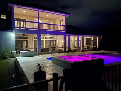 PRIVATE OASIS retreat with massive Heated Pool/hot tub in the on Emerald Bay Golf Club in Florida - for sale on GolfHomes.com, golf home, golf lot