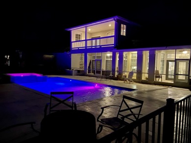 PRIVATE OASIS retreat with massive Heated Pool/hot tub in the on Emerald Bay Golf Club in Florida - for sale on GolfHomes.com, golf home, golf lot