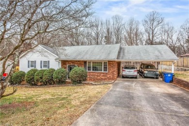 Fantastic opportunity to own this three-bedroom, two-bath home on Reynolds Park Golf Course in North Carolina - for sale on GolfHomes.com, golf home, golf lot