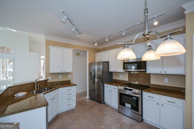 Welcome to this move-in ready home, tucked away on a quiet on Rivermont Golf and Country Club in Georgia - for sale on GolfHomes.com, golf home, golf lot