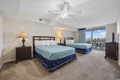 This fully furnished 3BR/3BA end unit offers a stunning on Barefoot Resort and Golf Club  in South Carolina - for sale on GolfHomes.com, golf home, golf lot