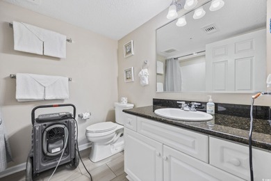 This fully furnished 3BR/3BA end unit offers a stunning on Barefoot Resort and Golf Club  in South Carolina - for sale on GolfHomes.com, golf home, golf lot