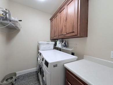 Live in the prestigious gated community of Golden Eagle. True 5 on Golden Eagle Country Club in Florida - for sale on GolfHomes.com, golf home, golf lot