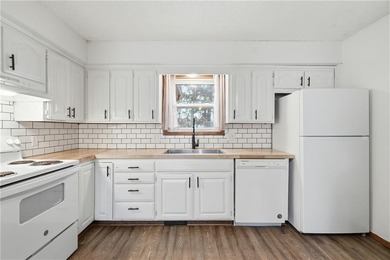 Updated golf-course duplex with strong income potential and on Holiday Island Golf Course in Arkansas - for sale on GolfHomes.com, golf home, golf lot