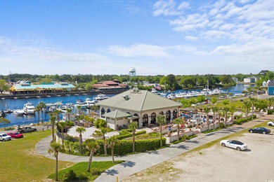 This fully furnished 3BR/3BA end unit offers a stunning on Barefoot Resort and Golf Club  in South Carolina - for sale on GolfHomes.com, golf home, golf lot