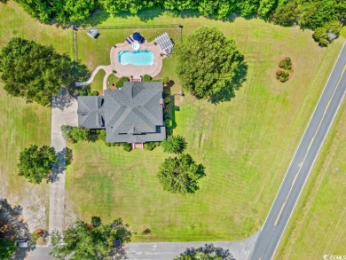 Nestled in the charming Myrtle Wood neighborhood of Johnsonville on The Wellman Country Club in South Carolina - for sale on GolfHomes.com, golf home, golf lot