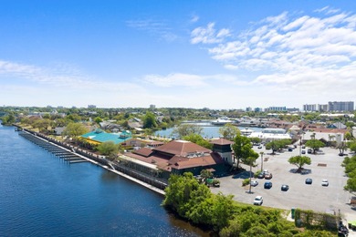 This fully furnished 3BR/3BA end unit offers a stunning on Barefoot Resort and Golf Club  in South Carolina - for sale on GolfHomes.com, golf home, golf lot