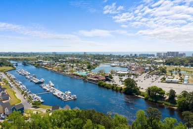 This fully furnished 3BR/3BA end unit offers a stunning on Barefoot Resort and Golf Club  in South Carolina - for sale on GolfHomes.com, golf home, golf lot