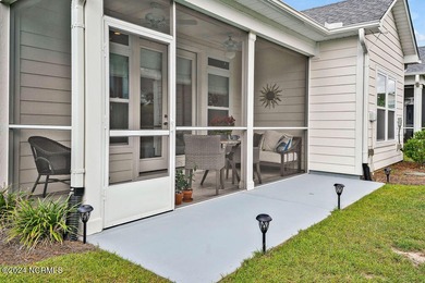 A beautiful and well-maintained home. The Owen, built by True on Cape Fear National At Brunswick Forest in North Carolina - for sale on GolfHomes.com, golf home, golf lot