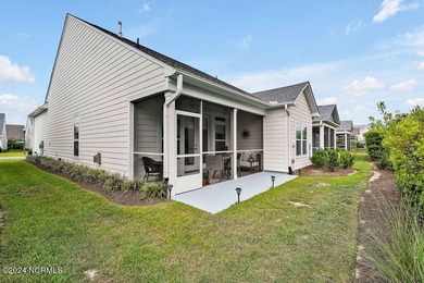 A beautiful and well-maintained home. The Owen, built by True on Cape Fear National At Brunswick Forest in North Carolina - for sale on GolfHomes.com, golf home, golf lot