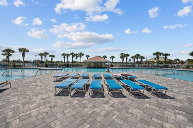 This fully furnished 3BR/3BA end unit offers a stunning on Barefoot Resort and Golf Club  in South Carolina - for sale on GolfHomes.com, golf home, golf lot