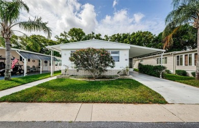 Rare Find! Welcome to this beautifully updated and lovingly on Tarpon Springs Golf Course in Florida - for sale on GolfHomes.com, golf home, golf lot