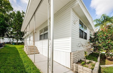 Rare Find! Welcome to this beautifully updated and lovingly on Tarpon Springs Golf Course in Florida - for sale on GolfHomes.com, golf home, golf lot