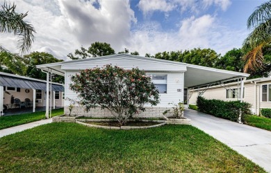Rare Find! Welcome to this beautifully updated and lovingly on Tarpon Springs Golf Course in Florida - for sale on GolfHomes.com, golf home, golf lot