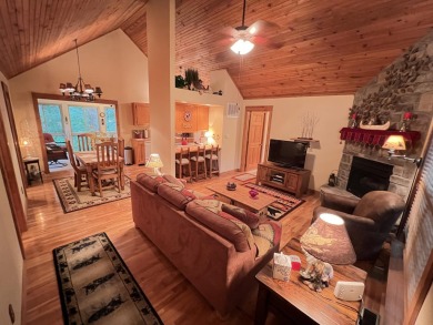 This pristine lodge located at the Cabins on Roark Creek in on Ledgestone Country Club and Golf Course in Missouri - for sale on GolfHomes.com, golf home, golf lot