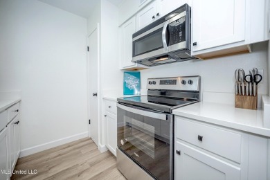 Fabulous furnished condo located in the heart of downtown Ocean on Gulf Hills Golf Club in Mississippi - for sale on GolfHomes.com, golf home, golf lot