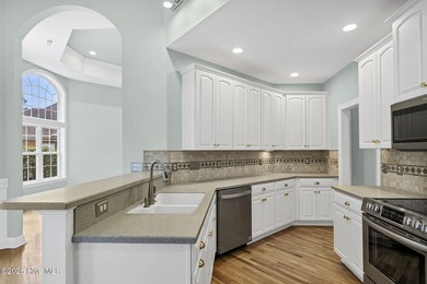 GOLF COURSE LOT WITH POND VIEW!! This 4 bedroom, 3 bathroom home on Magnolia Greens Golf Plantation in North Carolina - for sale on GolfHomes.com, golf home, golf lot