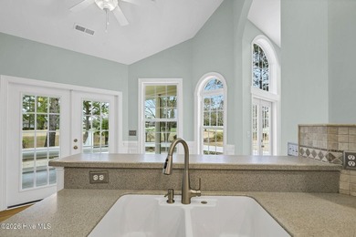 GOLF COURSE LOT WITH POND VIEW!! This 4 bedroom, 3 bathroom home on Magnolia Greens Golf Plantation in North Carolina - for sale on GolfHomes.com, golf home, golf lot