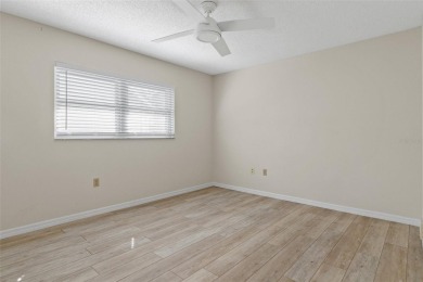This bright and airy, move-in ready home is a true gem on Timber Pines Golf Course in Florida - for sale on GolfHomes.com, golf home, golf lot